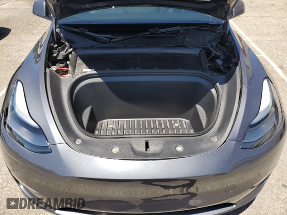 2024 Tesla Model Y Long Range with VIN 7SAYGDEEXRA215975, listed as a Copart auction lot 56705585 with 20,554 mi miles and Salvage Title. Bid and sale history available at DreamBid. Image 11.
