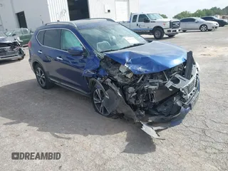 2017 Nissan Rogue SL with VIN 5N1AT2MTXHC803223, listed as a IAAI auction lot 42045458 with 126,013 mi miles and . Bid and sale history available at DreamBid. Image 1.