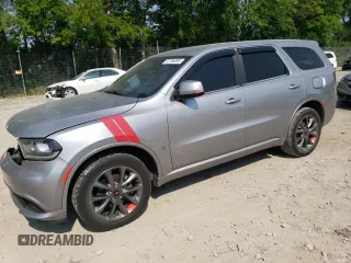 2014 Dodge Durango SXT with VIN 1C4RDJAG8EC455892, listed as a Copart auction lot 57796095 with 98,251 mi miles and Salvage title. Bid and sale history available at DreamBid. Image 1.