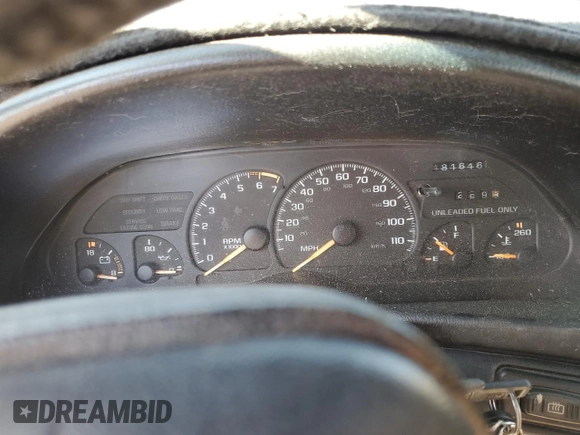 1994 Chevrolet Camaro z VIN 2G1FP22S1R2218727, wystawiony jako Copart lot #80922944 z przebiegiem 181 616 mil mil oraz Szkoda całkowita • Salvage title. Historia ofert i sprzedaży dostępna na DreamBid. Obrazek 9.
