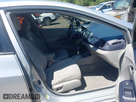 2010 Honda Insight EX with VIN JHMZE2H74AS041533, listed as a IAAI auction lot 42675766 with 203,357 mi miles and . Bid and sale history available at DreamBid. Image 5.