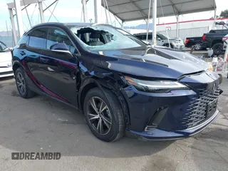 2025 Lexus RX with VIN JTJCHMAA2S2022218, listed as a IAAI auction lot 41397962 with 1,185 mi miles. Bid and sale history available at carsss.com. Image 1.