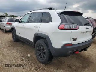 2019 Jeep Cherokee Trailhawk Elite with VIN 1C4PJMBX7KD140720, listed as a Copart auction lot 64268064 with 61,747 mi miles and Salvage Title. Bid and sale history available at carsss.com. Image 2.