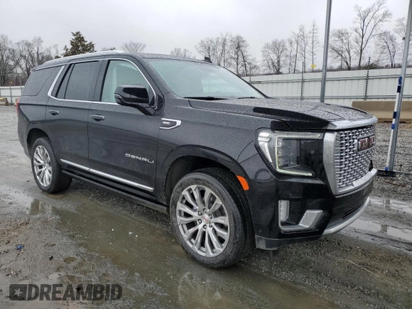 2023 GMC Yukon Denali with VIN 1GKS1DKL8PR402542, listed as a Copart auction lot 42001695 with 23,497 mi miles and Salvage Title. Bid and sale history available at carsss.com. Image 4.