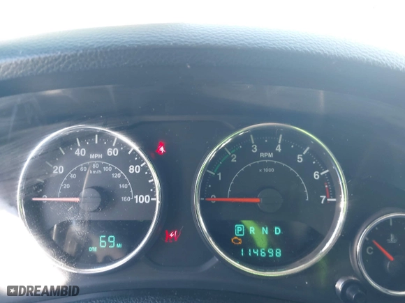 2013 Jeep Wrangler Unlimited Sport with VIN 1C4BJWDGXDL651995, listed as a IAAI auction lot 41578040 with 114,698 mi miles. Bid and sale history available at carsss.com. Image 7.