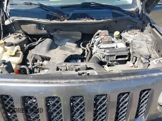 2014 Jeep Patriot Latitude with VIN 1C4NJPFA5ED928074, listed as a IAAI auction lot 42035754 with 155,636 mi miles and . Bid and sale history available at carsss.com. Image 10.
