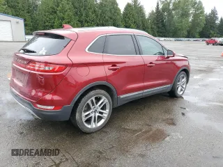 2015 Lincoln MKC z VIN 5LMTJ2AHXFUJ10820, wystawiony jako Copart lot #57139315 z przebiegiem 128 714 mil mil oraz Szkody całkowita. Historia ofert i sprzedaży dostępna na DreamBid. Obrazek 3.