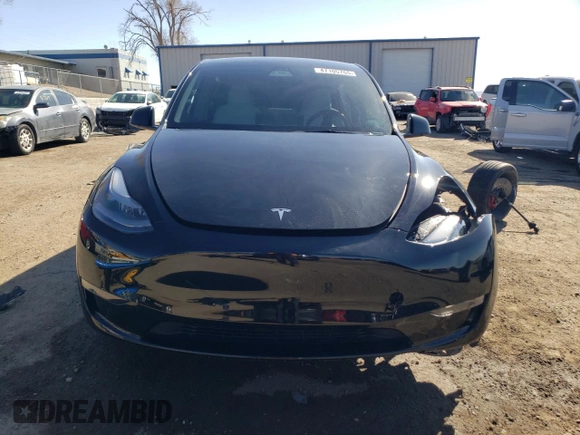 2023 Tesla Model Y Performance with VIN 7SAYGDEF3PF773031, listed as a Copart auction lot 47105765 with 25,604 mi miles and Salvage Title. Bid and sale history available at DreamBid. Image 5.