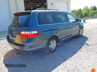 2006 Honda Odyssey EX-L with VIN 5FNRL38666B460590, listed as a IAAI auction lot 41998373 with 266,486 mi miles and . Bid and sale history available at carsss.com. Image 4.