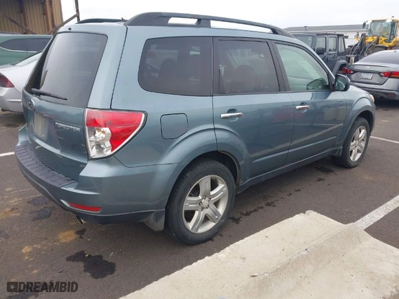 2009 Subaru Forester (Natl) X Limited with VIN JF2SH64689H776850, listed as a IAAI auction lot 41583563 with 128,228 mi miles. Bid and sale history available at carsss.com. Image 4.