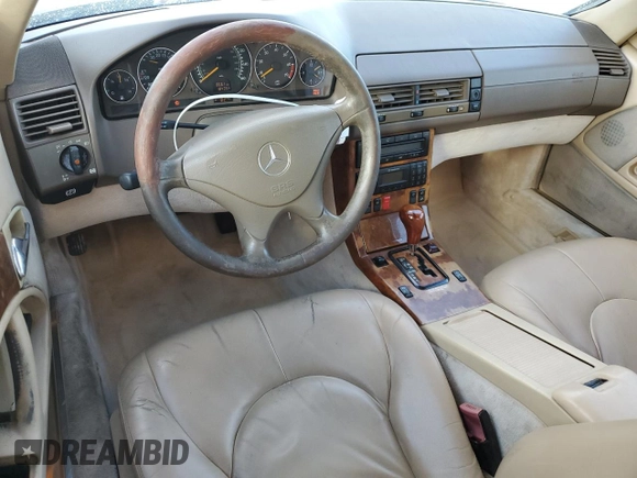 1999 Mercedes-Benz SL-Class with VIN WDBFA68F0XF186163, listed as a Copart auction lot 82669544 with 184,054 mi miles and Salvage Title. Bid and sale history available at carsss.com. Image 8.