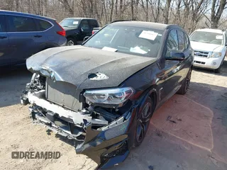 2020 BMW X3 M with VIN 5YMTS0C08L9B20402, listed as a IAAI auction lot 41761865 with 48,454 mi miles. Bid and sale history available at carsss.com. Image 2.