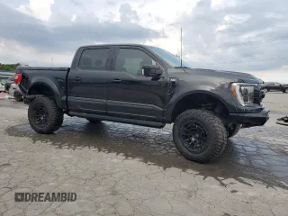 2023 Ford F-150 XL with VIN 1FTFW1E5XPKD88243, listed as a Copart auction lot 62351105 with 29,046 mi miles and Salvage title. Bid and sale history available at DreamBid. Image 4.