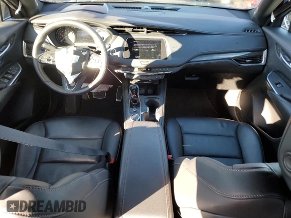 2022 Cadillac XT4 AWD Sport с VIN 1GYFZFR49NF130155, выставлен на аукционе Copart как лот 80286034 с пробегом 28 447 миль миль и Списание • Salvage title. История ставок и продаж доступна на DreamBid. Изображение 8.