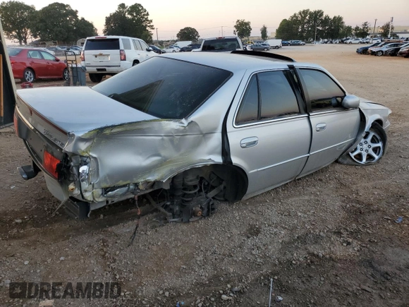 2000 Cadillac Seville Touring STS z VIN 1G6KY5494YU201138, wystawiony jako Copart lot #73485584 z przebiegiem 137 913 mil mil oraz Szkoda całkowita • Salvage title. Historia ofert i sprzedaży dostępna na DreamBid. Obrazek 3.