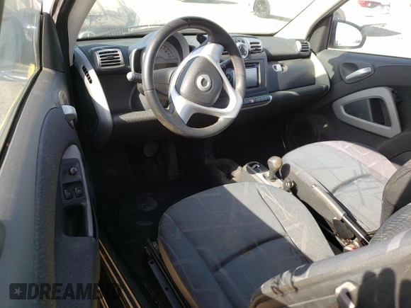 2008 Smart fortwo Pure с VIN WMEEJ31X68K099800, выставлен на аукционе Copart как лот 61967775 с пробегом Не указан миль и Чистый • Clean title. История ставок и продаж доступна на DreamBid. Изображение 8.