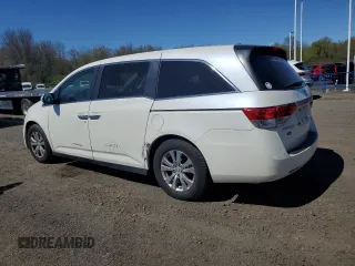 2016 Honda Odyssey EX-L with VIN 5FNRL5H66GB129277, listed as a Copart auction lot 54851955 with 147,496 mi miles and Clean Title. Bid and sale history available at carsss.com. Image 2.