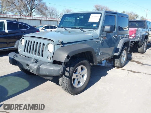 2014 Jeep Wrangler Sport with VIN 1C4AJWAGXEL177449, listed as a IAAI auction lot 41741519 with 117,056 mi miles and . Bid and sale history available at carsss.com. Image 2.