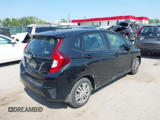 2015 Honda Fit LX z VIN 3HGGK5H51FM724566, wystawiony jako IAAI lot #42151755 z przebiegiem 168 744 mil mil oraz . Historia ofert i sprzedaży dostępna na DreamBid. Obrazek 4.