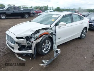 2016 Ford Fusion Titanium with VIN 3FA6P0SU5GR287017, listed as a IAAI auction lot 42316622 with 97,000 mi miles and . Bid and sale history available at DreamBid. Image 2.