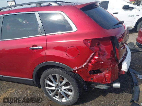 2015 Mazda CX-9 Grand Touring with VIN JM3TB3DA7F0448943, listed as a IAAI auction lot 41888414 with 104,052 mi miles. Bid and sale history available at carsss.com. Image 17.