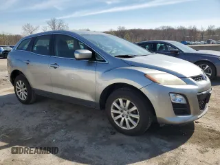 2012 Mazda CX-7 i SV z VIN JM3ER2AM2C0412683, wystawiony jako Copart lot #53774075 z przebiegiem 196 344 mil mil oraz Czysty tytuł • Clean title. Historia ofert i sprzedaży dostępna na DreamBid. Obrazek 4.