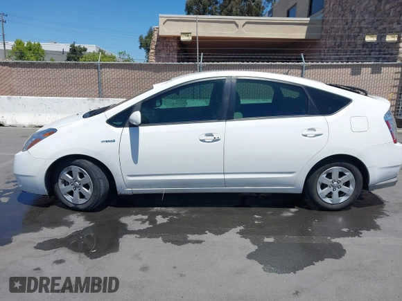 2009 Toyota Prius with VIN JTDKB20U397855359, listed as a IAAI auction lot 42223095 with 263,129 mi miles and . Bid and sale history available at DreamBid. Image 14.