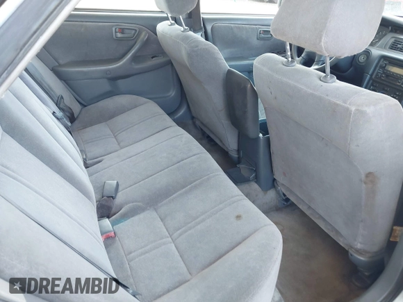 2001 Toyota Camry LE z VIN JT2BF22K710334750, wystawiony jako IAAI lot #42422525 z przebiegiem 273 999 mil mil oraz . Historia ofert i sprzedaży dostępna na DreamBid. Obrazek 7.