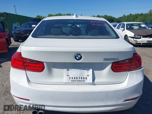 2014 BMW 3 Series 328i with VIN WBA3A5C58EF605108, listed as a IAAI auction lot 42129770 with 169,924 mi miles and . Bid and sale history available at DreamBid. Image 16.