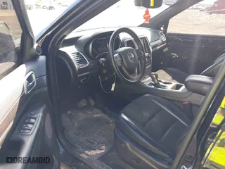 2018 Jeep Grand Cherokee Laredo E with VIN 1C4RJFAG8JC453706, listed as a IAAI auction lot 41688655 with 116,965 mi miles. Bid and sale history available at carsss.com. Image 5.
