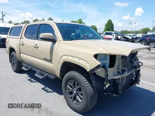 2020 Toyota Tacoma SR5 with VIN 3TMCZ5AN8LM297918, listed as a IAAI auction lot 42213690 with 57,611 mi miles and . Bid and sale history available at DreamBid. Image 1.