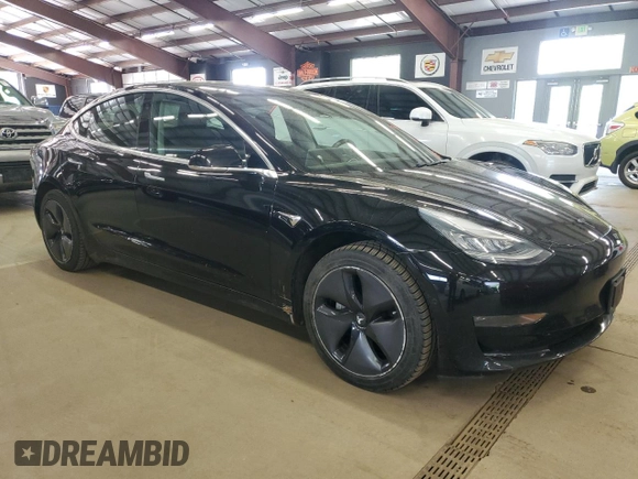 2018 Tesla Model 3 Long Range Battery z VIN 5YJ3E1EB4JF144295, wystawiony jako Copart lot #58754715 z przebiegiem 63 569 mil mil oraz Tytuł czysty. Historia ofert i sprzedaży dostępna na DreamBid. Obrazek 4.