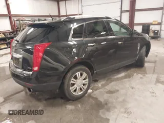 2012 Cadillac SRX Luxury Collection with VIN 3GYFNAE31CS645977, listed as a IAAI auction lot 41276810 with 133,071 mi miles. Bid and sale history available at carsss.com. Image 4.