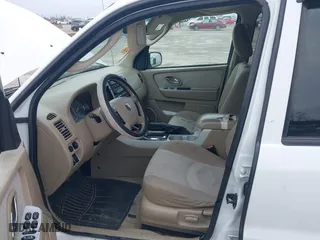 2006 Mercury Mariner Luxury with VIN 4M2YU56146KJ00694, listed as a IAAI auction lot 41619059 with 181,425 mi miles. Bid and sale history available at carsss.com. Image 5.