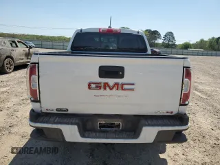 2021 GMC Canyon 4WD AT4 z VIN 1GTG6FEN5M1118081, wystawiony jako Copart lot #52452785 z przebiegiem 92 960 mil mil oraz Szkody całkowita. Historia ofert i sprzedaży dostępna na DreamBid. Obrazek 6.