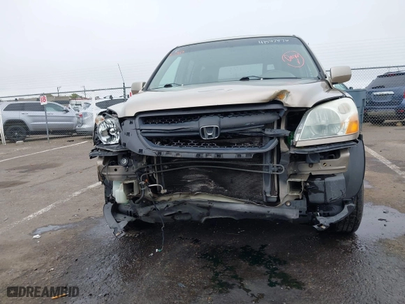 2005 Honda Pilot EX-L with NAVI with VIN 2HKYF18775H543185, listed as a IAAI auction lot 41597576 with 163,377 mi miles. Bid and sale history available at carsss.com. Image 6.