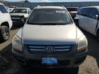 2006 Kia Sportage LX z VIN KNDJF724967294171, wystawiony jako Copart lot #75556994 z przebiegiem 141 868 mil mil oraz Szkoda całkowita • Salvage title. Historia ofert i sprzedaży dostępna na DreamBid. Obrazek 5.