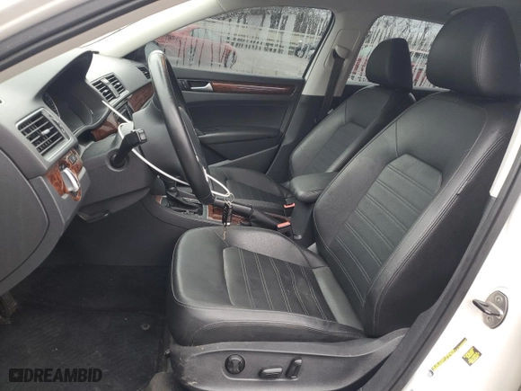 2012 Volkswagen Passat SEL with VIN 1VWCP7A37CC068273, listed as a Copart auction lot 84088624 with 70,672 mi miles and Salvage Title. Bid and sale history available at carsss.com. Image 7.