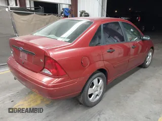 2003 Ford Focus SE z VIN 1FAFP34Z83W231672, wystawiony jako IAAI lot #42322702 z przebiegiem 173 625 mil mil oraz . Historia ofert i sprzedaży dostępna na DreamBid. Obrazek 4.