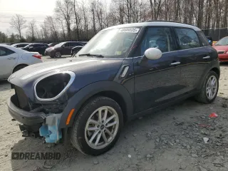 2016 MINI Countryman S with VIN WMWZC3C52GWT10422, listed as a Copart auction lot 48889535 with 67,383 mi miles and Salvage Title. Bid and sale history available at DreamBid. Image 1.