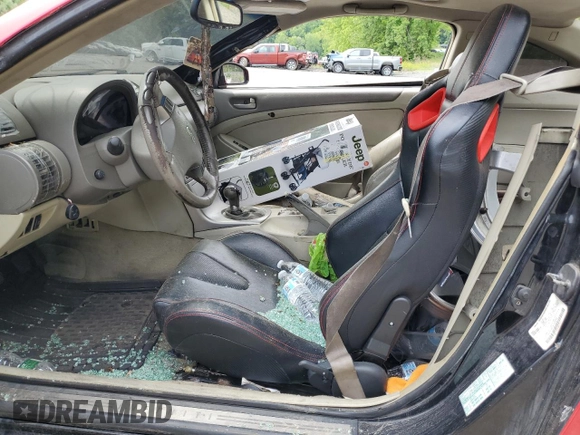 2003 Infiniti G35 w/Leather z VIN JNKCV54E53M207514, wystawiony jako Copart lot #58396655 z przebiegiem Nie podano mil oraz Szkoda całkowita • Salvage title. Historia ofert i sprzedaży dostępna na DreamBid. Obrazek 7.
