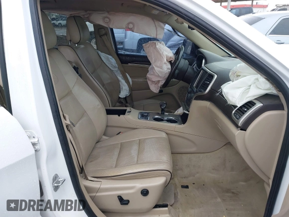 2014 Jeep Grand Cherokee Overland with VIN 1C4RJFCG9EC162098, listed as a IAAI auction lot 41746022 with 120,588 mi miles and . Bid and sale history available at DreamBid. Image 5.