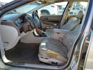 2000 Chrysler 300M M z VIN 2C3HE66G8YH319640, wystawiony jako Copart lot #88080175 z przebiegiem 231 689 mil mil oraz Szkoda całkowita • Salvage title. Historia ofert i sprzedaży dostępna na DreamBid. Obrazek 7.