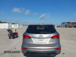 2017 Hyundai Santa Fe 2.4L z VIN 5XYZTDLB7HG444033, wystawiony jako IAAI lot #42263907 z przebiegiem 107 454 mil mil oraz . Historia ofert i sprzedaży dostępna na DreamBid. Obrazek 16.