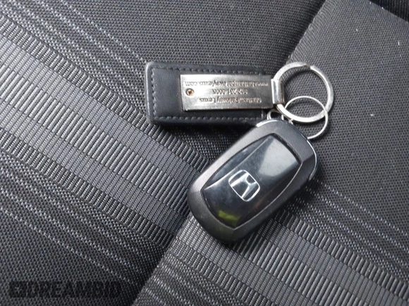 2024 Honda Civic Sport with VIN 2HGFE2F51RH594148, listed as a IAAI auction lot 41304184 with 11,307 mi miles and . Bid and sale history available at DreamBid. Image 11.