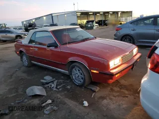 1985 Chevrolet Cavalier with VIN 1G1JE67W1F7185395, listed as a Copart auction lot 80670104 with 5,776 mi miles and Clean Title. Bid and sale history available at DreamBid. Image 4.