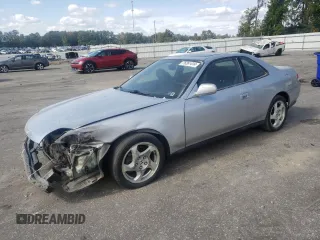 2001 Honda Prelude with VIN JHMBB62421C003308, listed as a Copart auction lot 76261414 with 183,781 mi miles and Salvage Title. Bid and sale history available at DreamBid. Image 1.