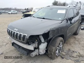 2019 Jeep Cherokee Latitude Plus with VIN 1C4PJMLB4KD323124, listed as a IAAI auction lot 41782873 with 81,929 mi miles and . Bid and sale history available at carsss.com. Image 6.