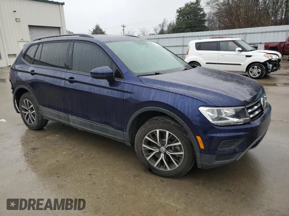 2021 Volkswagen Tiguan S with VIN 3VV1B7AX7MM065841, listed as a Copart auction lot 43815795 with 64,454 mi miles and Salvage title. Bid and sale history available at DreamBid. Image 4.