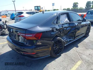 2019 Volkswagen Jetta GLI S z VIN 3VW6T7BU4KM255418, wystawiony jako IAAI lot #42141020 z przebiegiem 74 066 mil mil oraz . Historia ofert i sprzedaży dostępna na DreamBid. Obrazek 4.